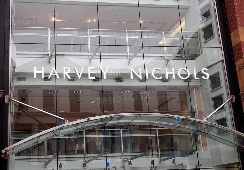 Leeds, west yorkshire, united kingdom, 7 july 2021: sign and windows above the front entrance of harvey nichols department store on briggate in leeds