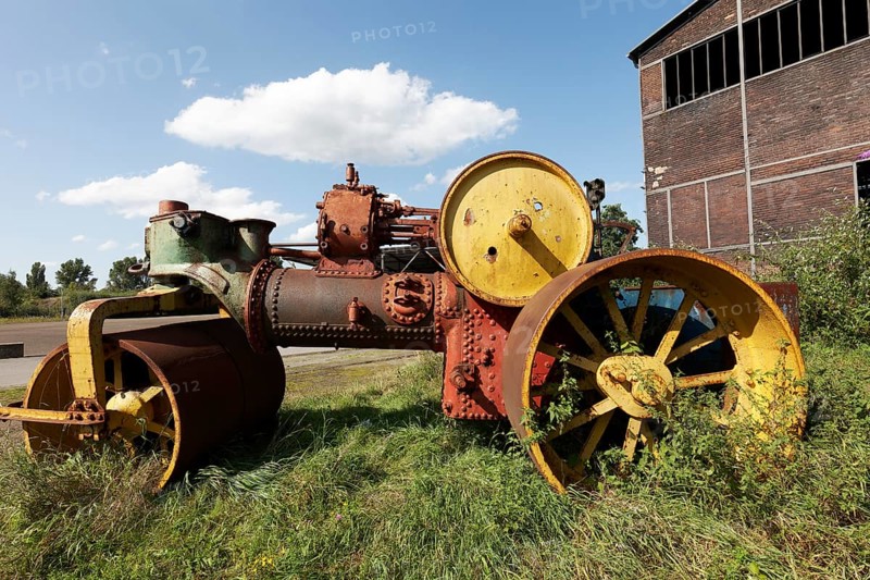 Historic steam roller on the site of the former steelworks, Landschaftspark Duisburg-Nord, Duisburg, North Rhine-Westphalia, Germany, Europe