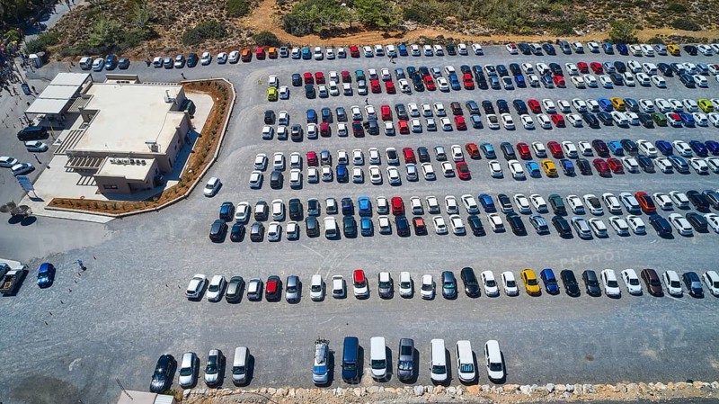 Overtourism, aerial view of a full car park with many different cars in sunny weather, Elafonissi, lagoon, southwest tip of Crete, Crete, Greek Islands, Greece, Europe