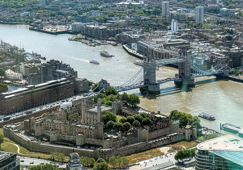 Aerial view of the famous historic Tower Bridge over the River Thames in an urban setting, London, United Kingdom, Europe