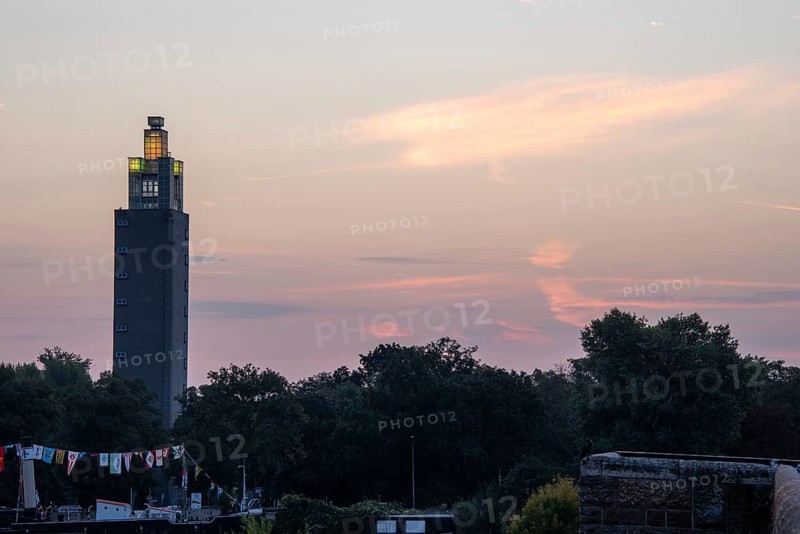 Illuminated Albin Mueller Tower in Rotehorn City Park shortly in front of sunrise, Magdeburg, Saxony-Anhalt, Germany, Europe