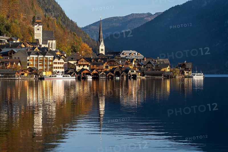 View of Hallstatt and Lake Hallstatt. In the morning in autumn. Good weather, blue sky. Reflection. Hallstatt, Gmunden, Salzkammergut, Upper Austria, Austria, Europe