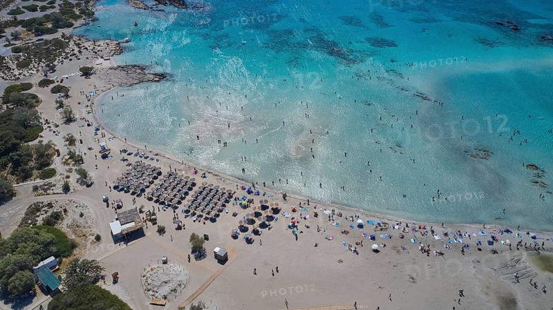 Overtourism, aerial view of a beach with many people and umbrellas, surrounded by clear water, Elafonissi, lagoon, south-west tip of Crete, Crete, Greek Islands, Greece, Europe