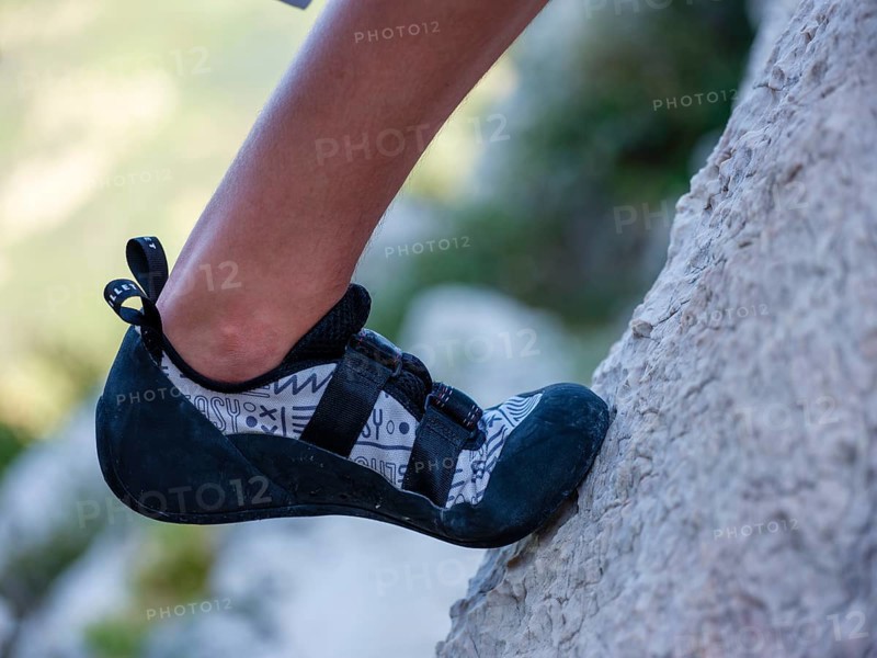 Close-up, friction climbing shoe standing on a rock slab, Belove Stene climbing area, island of Krk, Croatia, Europe