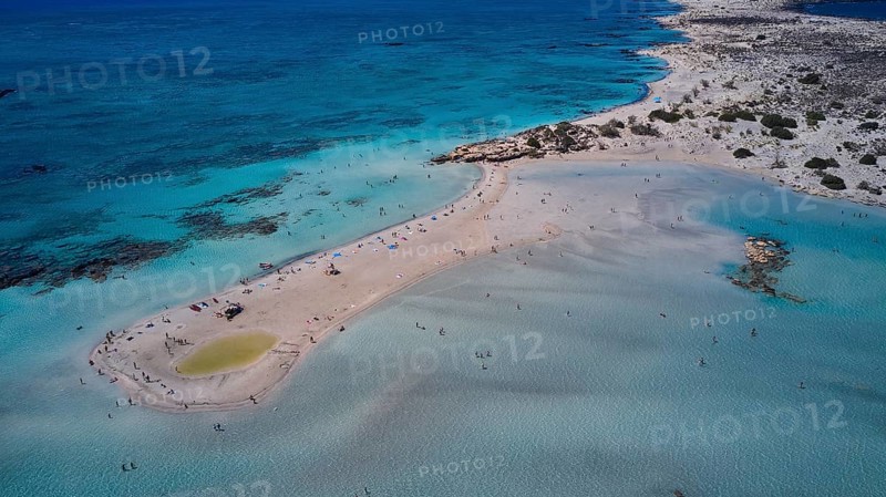 Overtourism, aerial view of a sandy beach with people in the shallow, clear water of the sea, Elafonissi, lagoon, southwestern tip of Crete, Crete, Greek Islands, Greece, Europe