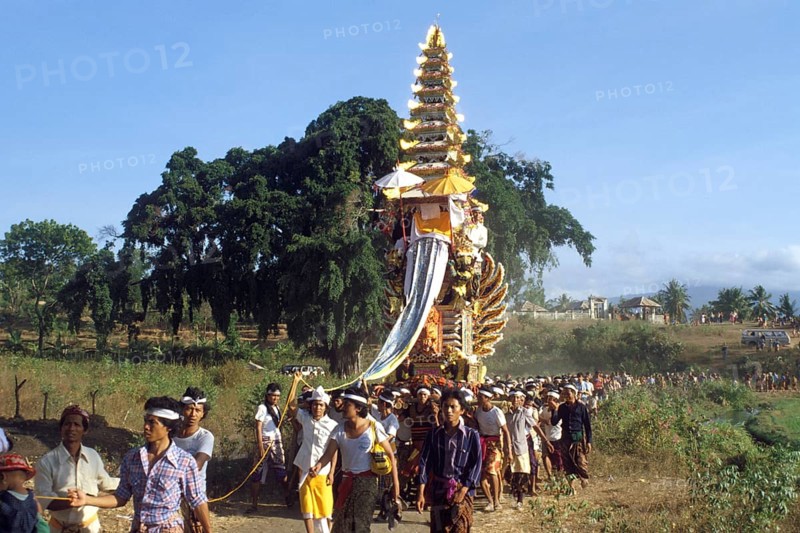 Ngaben (cremation ceremony), procession to the cremation site, cremation tower decorated with mytological depictions, Bali, Indonesia, Asia