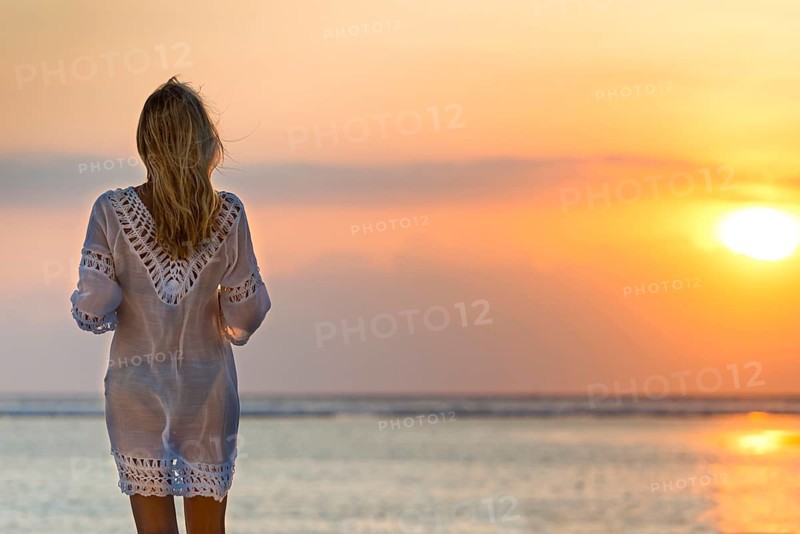Woman in the evening sun, sea, holiday, sunset, beach, travel, tourism, dress, transparent, summer, sun, holiday feeling, paradise, lightness, mood, symbolic, Bali, Indonesia, Asia