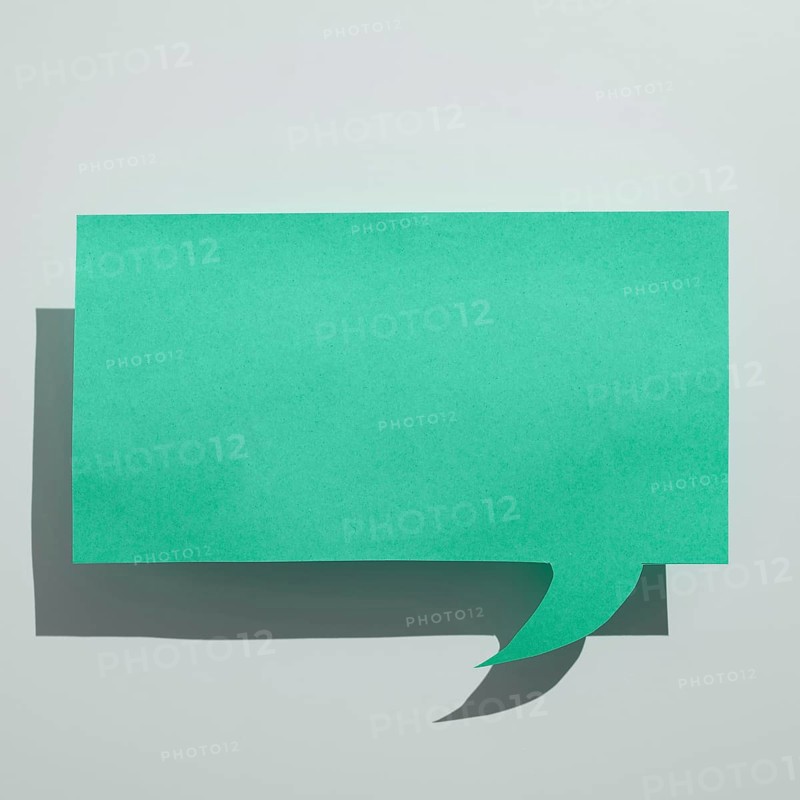Paper in shape of dialog box with message. Infromation on sticker