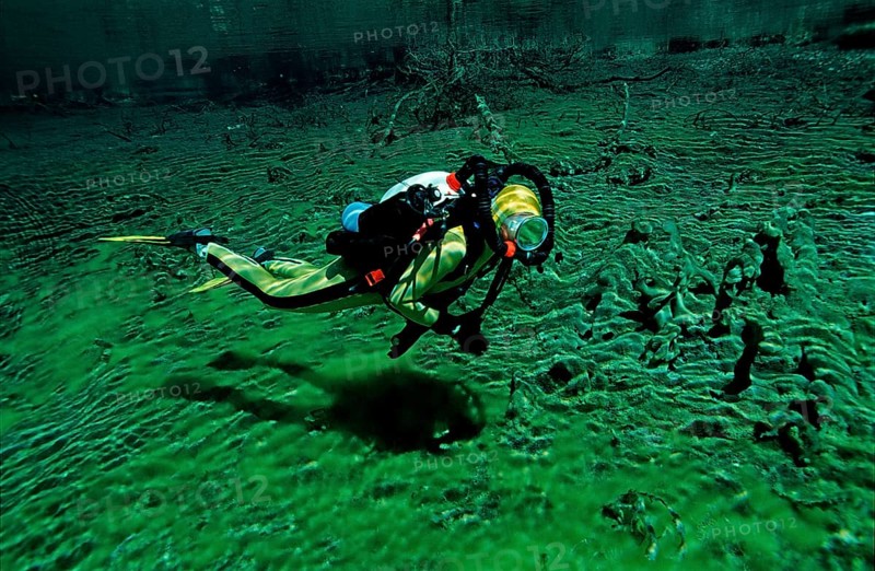 Diver in a mountain lake, Austria, Tyrol, Europe