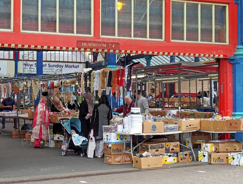 Huddersfield, yest yorkshire, United Kingdom, 20 May 2019: women shopping for fabric and sewing materials on a stall in huddersfield market in west yorkshire, Europe