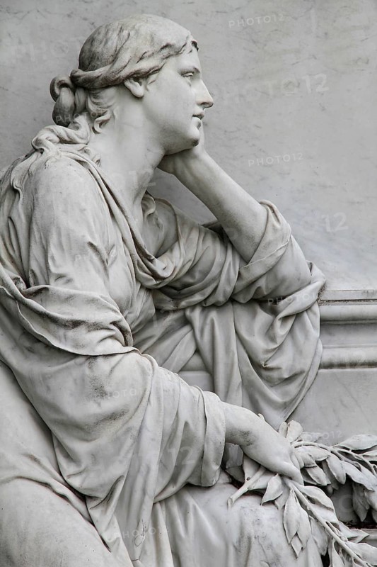 Cemetery mourning statue of a woman