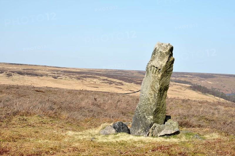 The greenwood stone a historic 16th century boundary marking the borders of midgley and wadworth moor in calderdale west yorkshire surrounded by pennine landscape