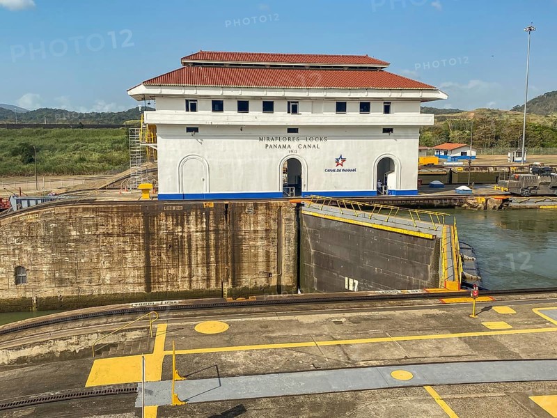 Panama Canal lock building surrounded by waterway and marked parking areas, panama city, panamakanl, panama, Central America