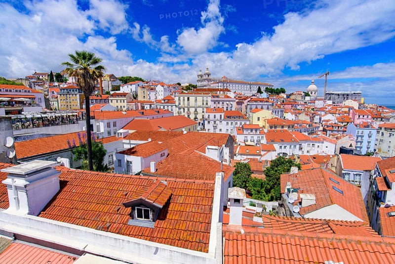 View of the city & Tagus River from Miradouro de Santa Luzia, an observation deck in Lisbon, Portugal, Europe