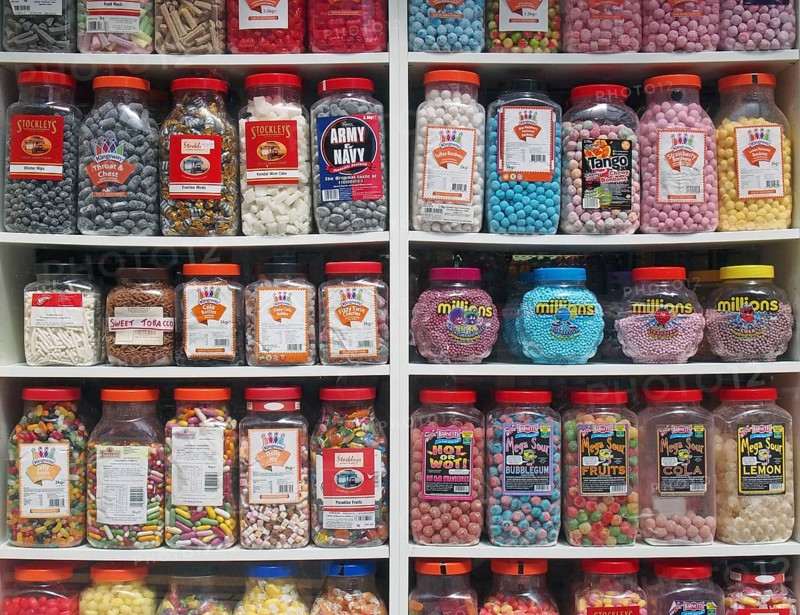 Southport, merseyside, united kingdom, 28 june 2019: jars of old fashioned traditional british sweets in on display in the window of a shop