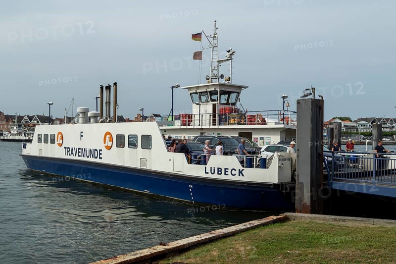 Cars and tourists leaving the car ferry in the harbour on the Priwall, seaside resort of Travemünde, Hanseatic city of Lübeck, Schleswig-Holstein, Germany, Europe