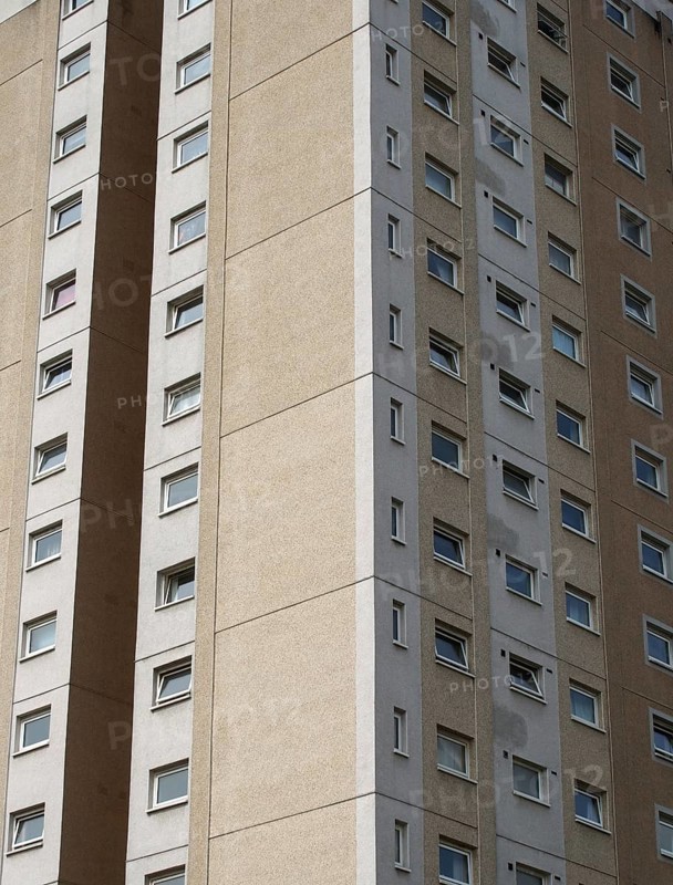A view of a typical british council built high rise concrete apartment block typical of public housing in the uk