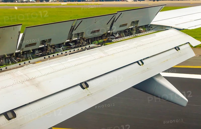 View of the spoiler uprising during a landing of an airliner at Brussels National Airport