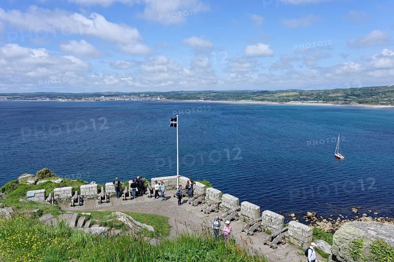 View of coast from fortress with cannon, St Michaels Mount, Marazion, England, UK