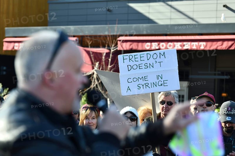 CHRISTCHURCH, NEW ZEALAND, JULY 24, 2021, A man speaks at a protest rally at the Bridge of Remembrance in Christchurch. Activists spoke against increasing government control over Covid vaccinations, farm taxes and civil liberties