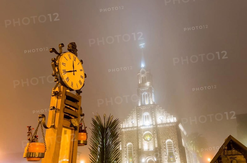 St. Peter the Apostle Mother Church (Igreja Matriz São Pedro Apóstolo) and famous thermometer in night lighting, Gramado, Rio Grande do Sul, Brazil, South America