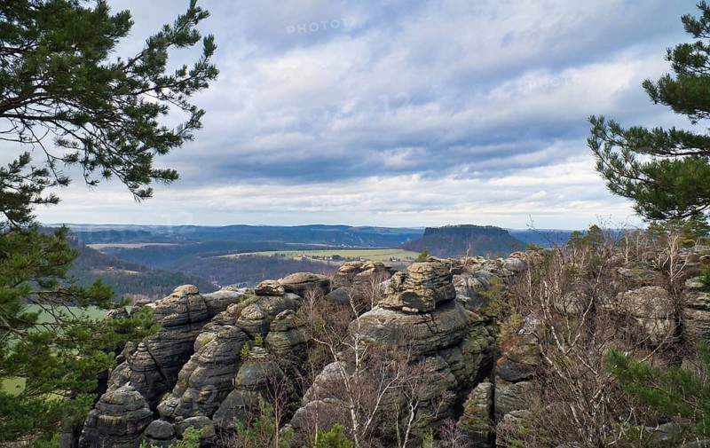 View from the Pfaffenstein in black and white. Forests, mountains, vastness, panorama. Landscape from the Elbe Sandstone Mountains