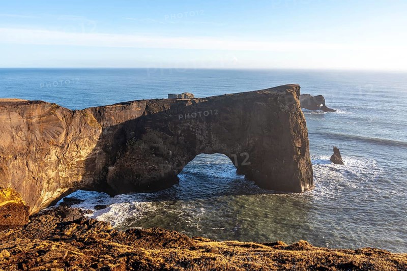 Famous arch on Dyrholaey beach in Iceland in the cold winter, near Vik