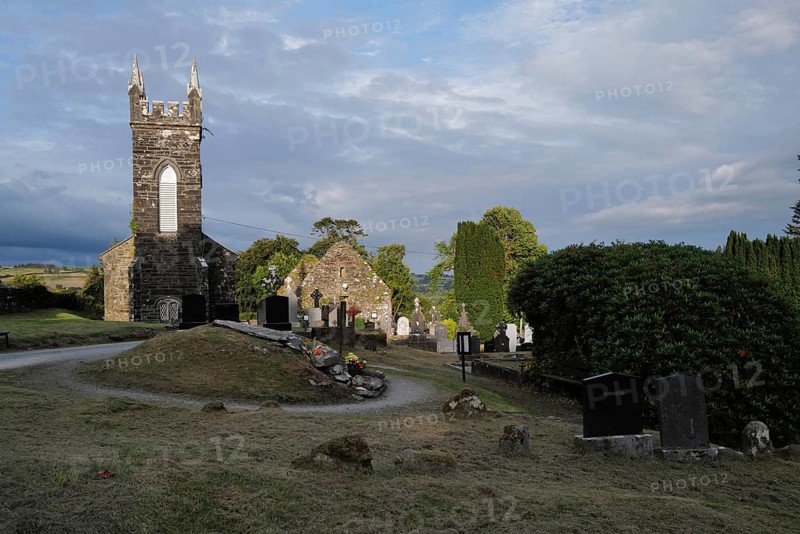 Church and graveyard in Cúil Aodha in West Cork on a sunny evening. County Cork, Ireland, Europe