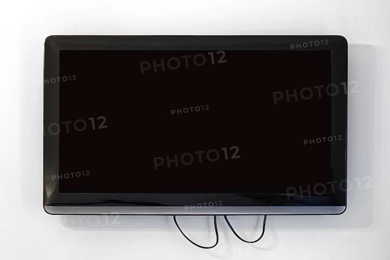 Black lcd TV set at wall