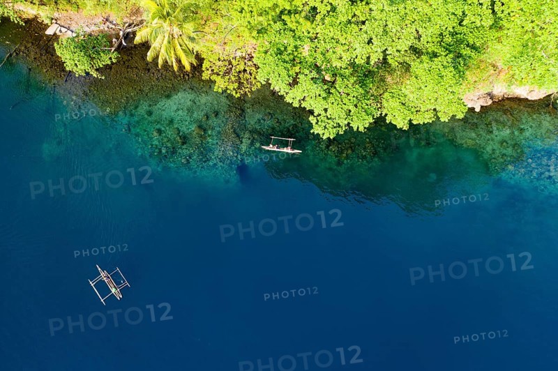 Inhabitants with outrigger boats, Tufi, Cape Nelson, Papua New Guinea, Oceania