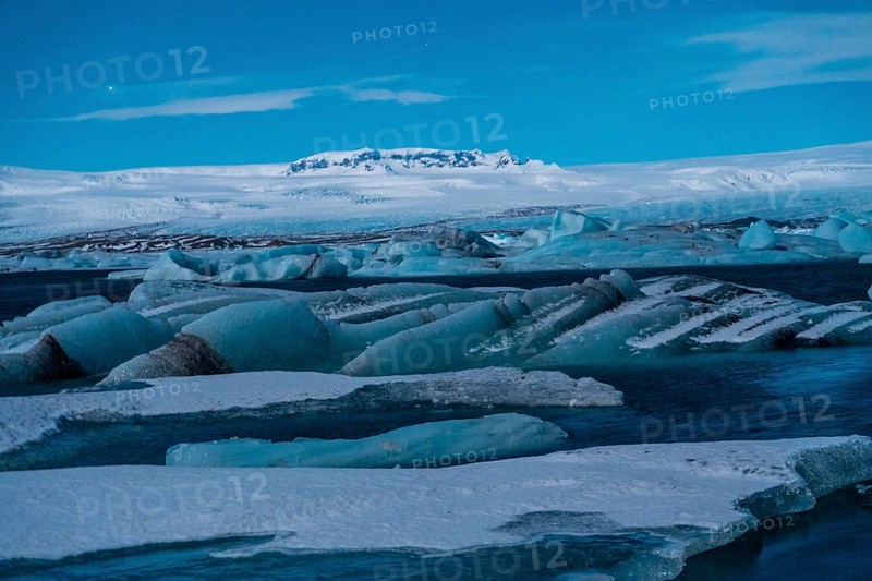 Detail of Jokulsarlon ice lake at night in winter. Iceland