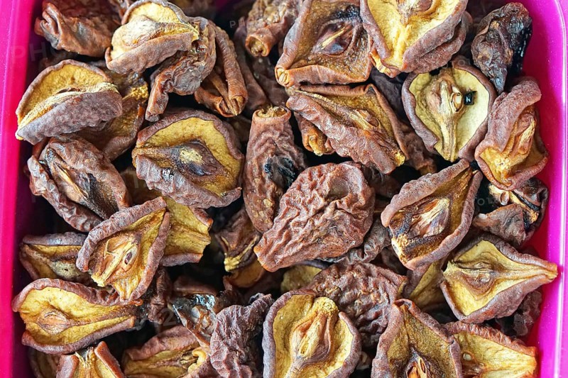 Dried and dehydrated pears fruits in crate