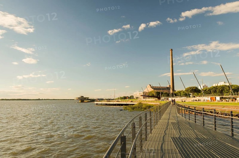 Porto Alegre, Rio Grande do Sul, Brazil, March 29, 2021: Beautiful sunset on the waterfront of Guaíba, Gasometro at golden hour, South America