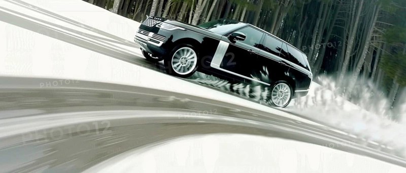 Car speeding through a snowy forest landscape, showcasing dynamic motion, AI generated
