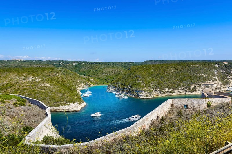 Arbor, boats, landscape and blue sky at Bonifacio, Corsica