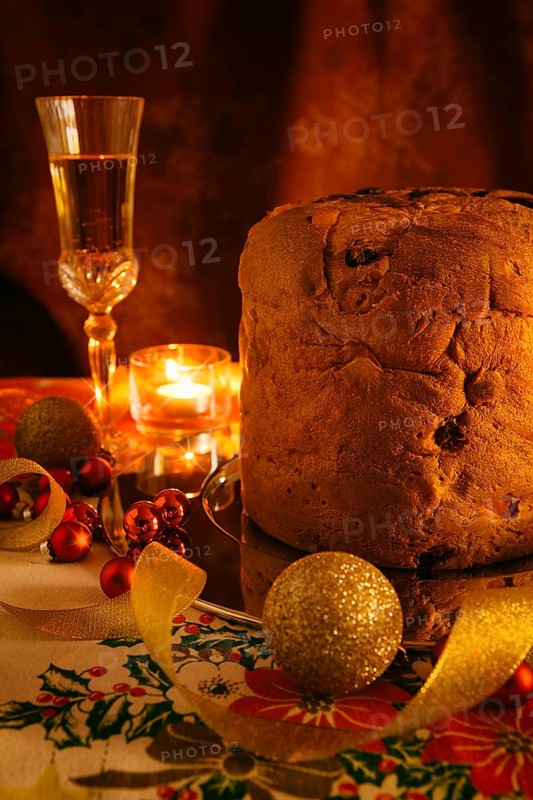Italian panettone and sparkling wine with Christmas decorations