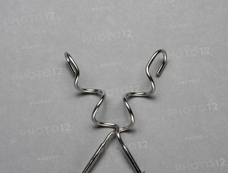 Two kneading hooks on grey background