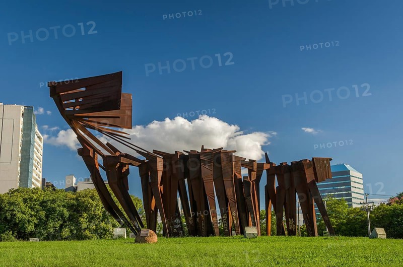 Porto Alegre, Rio Grande do Sul, Brazil, March 29, 2021: Beautiful photograph of the square of the Azoreans, bridge and monument to the Azoreans on a sunny day, South America