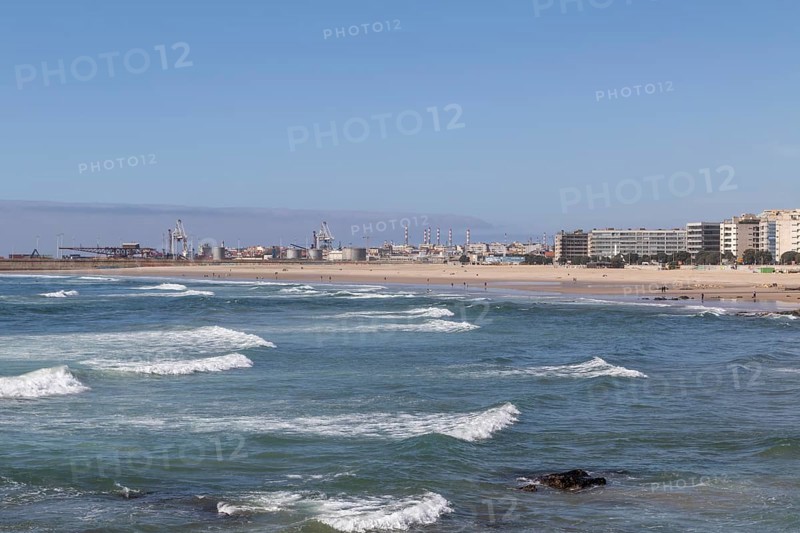City view with surf in the Atlantic Ocean at Praia de Matosinhos beach in Matosinhos, Norte region, Porto district, Portugal, Europe
