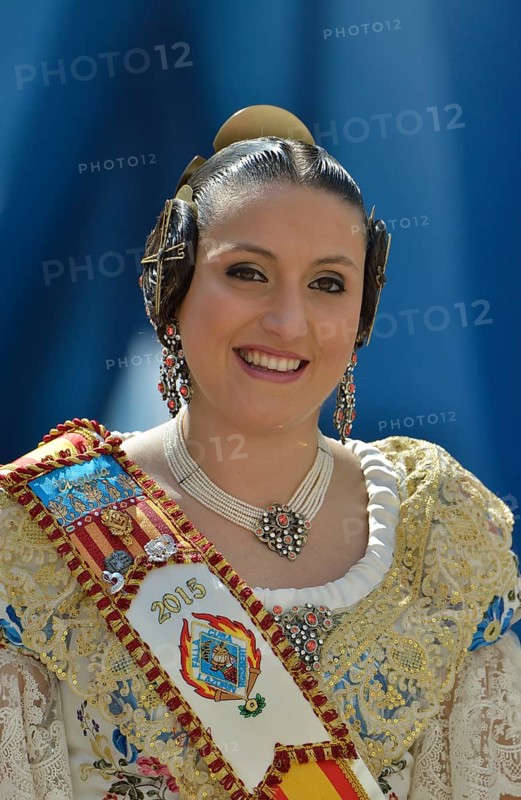Fallas festival, woman in a traditional costume during the parade in the Plaza de la Virgen de los Desamparados, Valencia, Spain, Europe