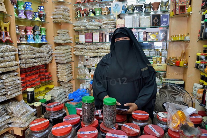 Incense seller at her booth on the incense market, Salalah, Dhofar Region, Orient, Oman, Asia