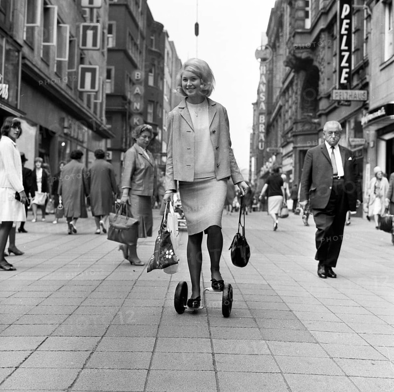 Shopping on Westenhellweg and leisure in Dortmund's open-air swimming pool with Twisty, here in 1966 in Dortmund, a means of transport found an attentive public but no future and disappeared. On Westenhellweg, Germany, Europe