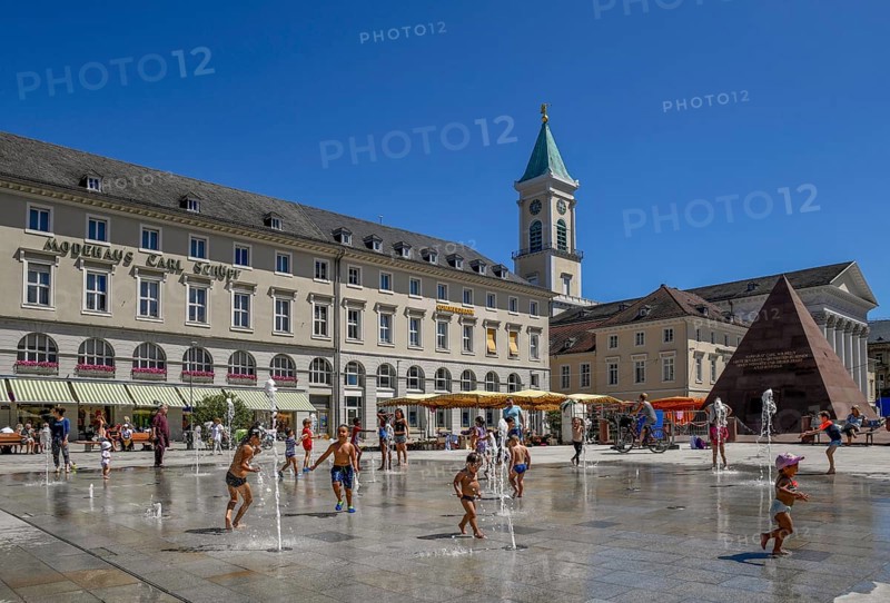 Children playing at the water games on the market place, Karlsruhe, Baden-Württemberg, Germany, Europe