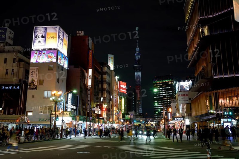 Street scene in the district Asakusa, in the background the Skytree, with 634 meters the highest television tower of the earth, Tokyo, Japan, Asia