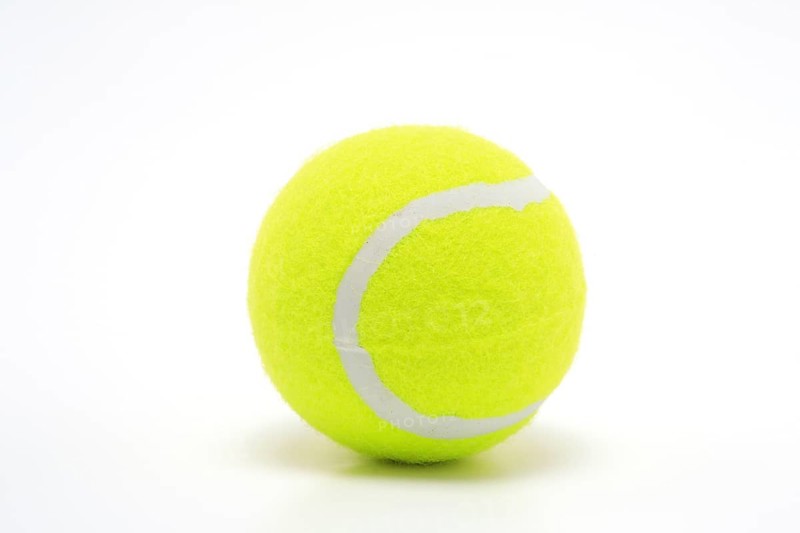 Sports equipment, single yellow tennis ball