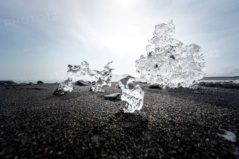 Ice, pieces of ice on black sand beach, on black lava beach Diamond Beach, Southeast Iceland, Iceland, Europe