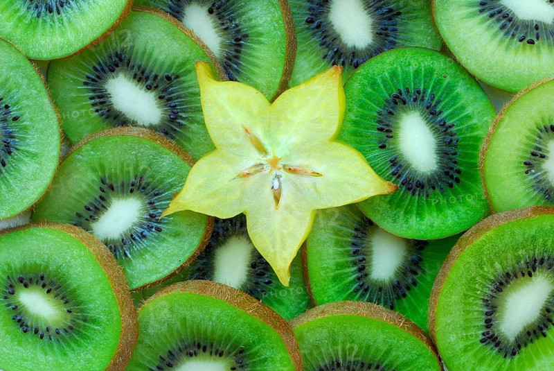 Carambola on Chinese gooseberry slices (Averrhoa carambola) ) (starry green) (averrhoa carambola) () (starfruit) () (starfruit) (averrhoa carambola) () (starfruit) () (starfruit) (Kiwifruit) (starfruit) (Averrhoa carambola), starfruit