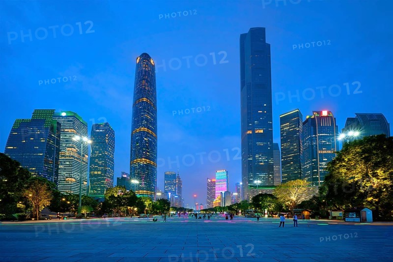 Guangzhou cityscape skyline Flower City Square illuminated in the evening. Guangzhou, China, Asia