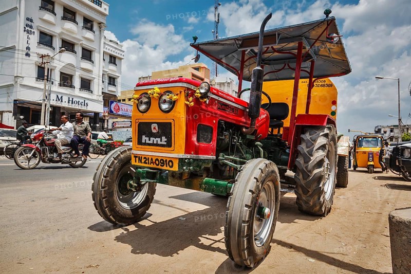 KANCHIPURAM, INDIA, SEPTEMBER 12, 2009: Wheeled tractor in indian street