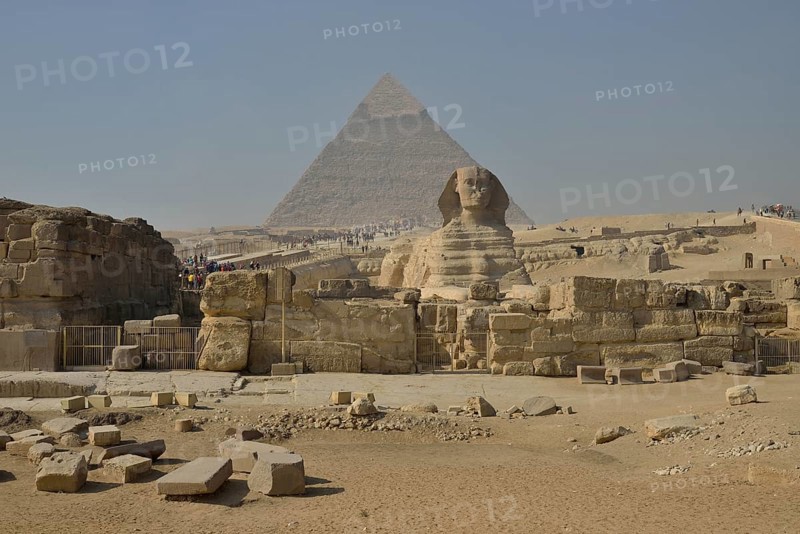 Sphinx or Great Sphinx of Giza, lion with a human head, built in the 4th Egyptian dynasty around 2700 BC, in front of the Pyramid of Chephren, Giza, Egypt, Africa